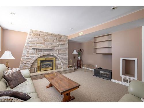 10 Noelle Drive, St. Catharines, ON - Indoor Photo Showing Living Room With Fireplace