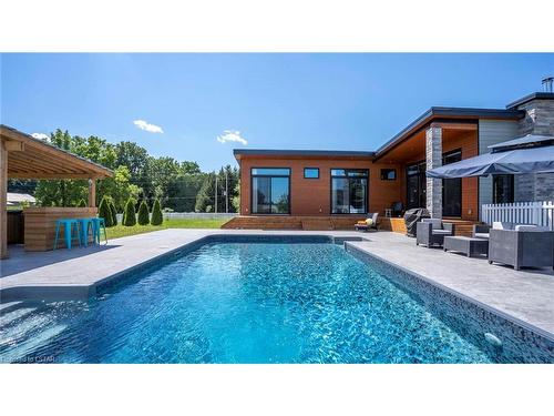 8037 Walkers Drive, Strathroy, ON - Outdoor With In Ground Pool