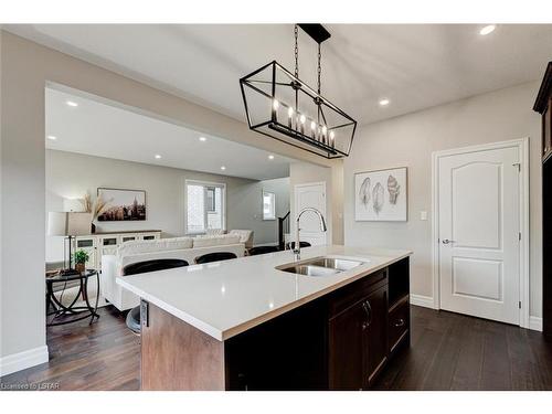 18 Woodmere Path, Ilderton, ON - Indoor Photo Showing Kitchen With Double Sink
