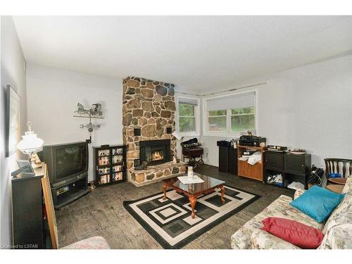 30622 Hungry Hollow Road, Arkona, ON - Indoor Photo Showing Living Room With Fireplace