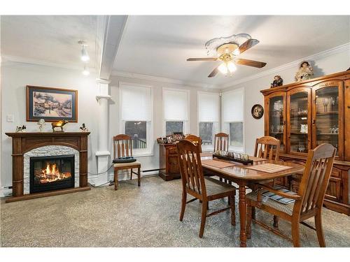 30622 Hungry Hollow Road, Arkona, ON - Indoor Photo Showing Dining Room With Fireplace
