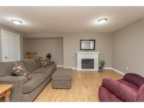1104 Gladstone Drive, Dorchester, ON - Indoor Photo Showing Living Room With Fireplace