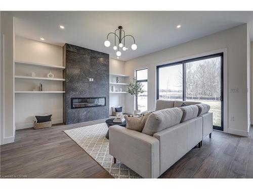 3964 Big Leaf Trail, London, ON - Indoor Photo Showing Living Room With Fireplace