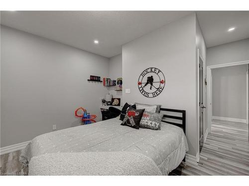 22345 Allen Road, Mount Brydges, ON - Indoor Photo Showing Bedroom