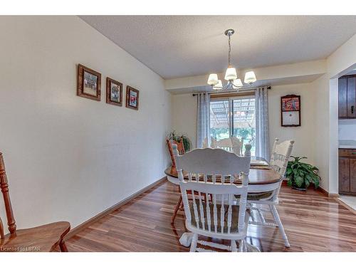 33374 Queen Street, Ailsa Craig, ON - Indoor Photo Showing Dining Room With Fireplace