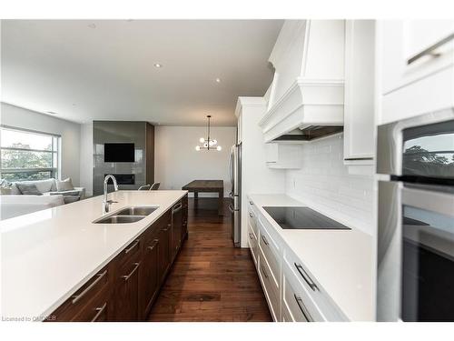 309-1705 Fiddlehead Place, London, ON - Indoor Photo Showing Kitchen With Double Sink With Upgraded Kitchen