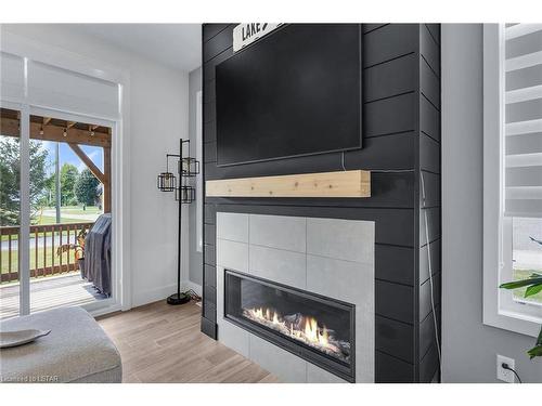 33977 Kildeer Drive, Dashwood, ON - Indoor Photo Showing Living Room With Fireplace