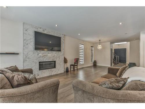2428 Black Rail Terrace, London, ON - Indoor Photo Showing Living Room With Fireplace