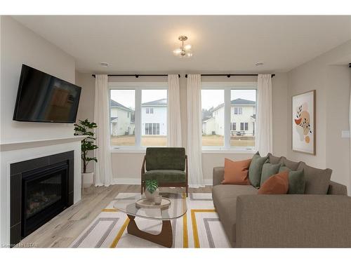 110 Sandcastle Key, Port Stanley, ON - Indoor Photo Showing Living Room With Fireplace