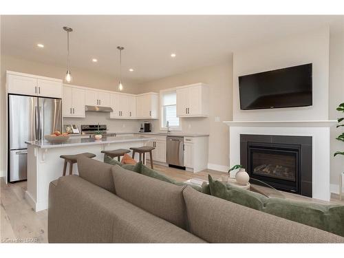 110 Sandcastle Key, Port Stanley, ON - Indoor With Fireplace