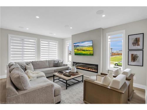 4071 Big Leaf Trail, London, ON - Indoor Photo Showing Living Room With Fireplace