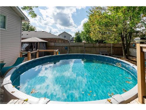27 Robin Street, Ailsa Craig, ON - Outdoor With Above Ground Pool With Backyard