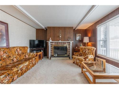 279 Pebble Beach Parkway, Grand Bend, ON - Indoor Photo Showing Living Room With Fireplace