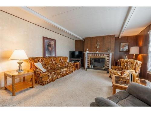 279 Pebble Beach Parkway, Grand Bend, ON - Indoor Photo Showing Living Room With Fireplace