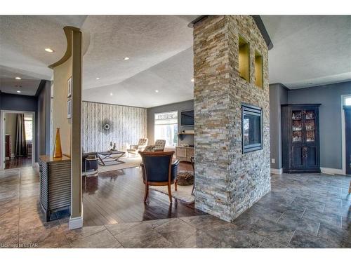 7242 Grande River Line, Chatham, ON - Indoor With Fireplace