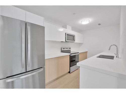 415-3320 Stella Crescent, Windsor, ON - Indoor Photo Showing Kitchen With Stainless Steel Kitchen With Double Sink