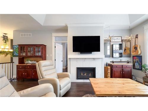 7 Sunrise Lane, Grand Bend, ON - Indoor Photo Showing Living Room With Fireplace
