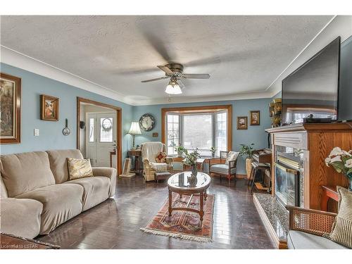 949 Midleton-Nwal Tline Road, Courtland, ON - Indoor Photo Showing Living Room With Fireplace