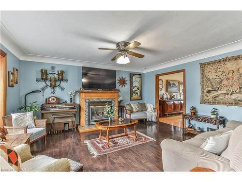 949 Midleton-Nwal Tline Road, Courtland, ON - Indoor Photo Showing Living Room With Fireplace