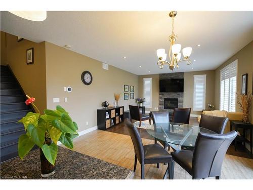 968 Springbank Avenue N, Woodstock, ON - Indoor Photo Showing Dining Room With Fireplace
