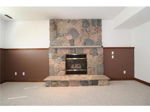 9857 Leonard Street, Grand Bend, ON - Indoor Photo Showing Living Room With Fireplace
