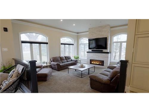 22628 Richmond Street, London, ON - Indoor Photo Showing Living Room With Fireplace