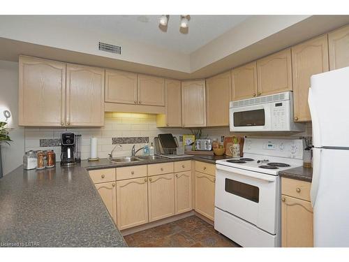 11-40 Ontario Street S, Grand Bend, ON - Indoor Photo Showing Kitchen With Double Sink