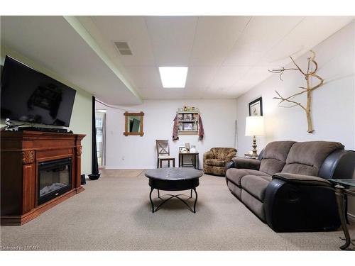 54715 Light Line, Vienna, ON - Indoor With Fireplace