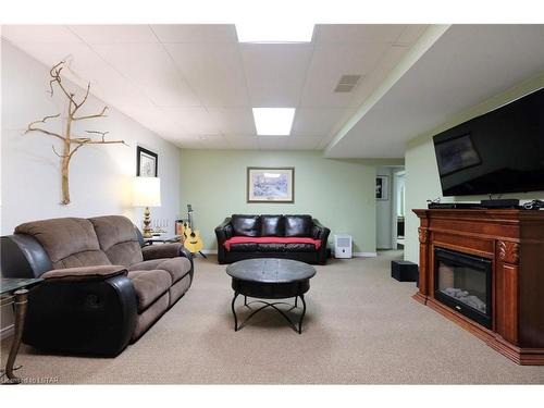 54715 Light Line, Vienna, ON - Indoor Photo Showing Other Room With Fireplace