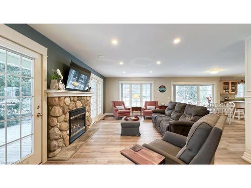 8 Harbour Park Court, Grand Bend, ON - Indoor Photo Showing Living Room With Fireplace