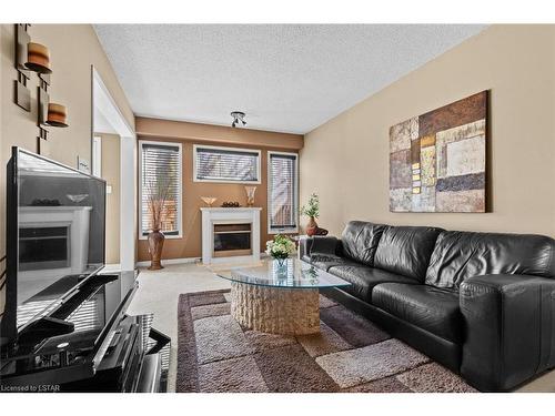 20-505 Proudfoot Lane, London, ON - Indoor Photo Showing Living Room With Fireplace