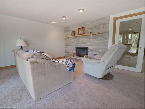 307 Parkhill Drive, North Middlesex, ON - Indoor Photo Showing Living Room With Fireplace