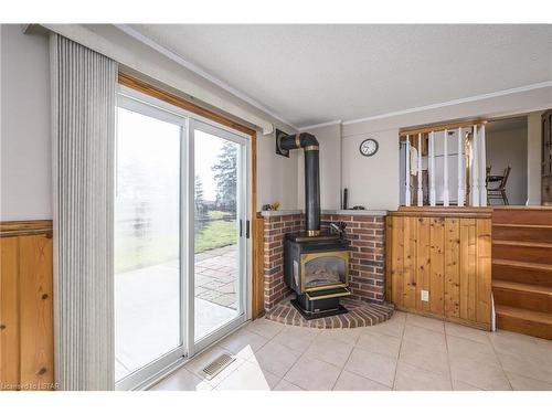 5054 Westchester Bourne, Thames Centre, ON - Indoor With Fireplace