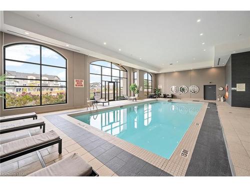 1104-260 Villagewalk Boulevard, London, ON - Indoor Photo Showing Other Room With In Ground Pool