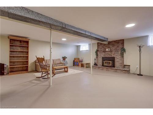 57604 Tunnel Line, Vienna, ON - Indoor Photo Showing Basement With Fireplace