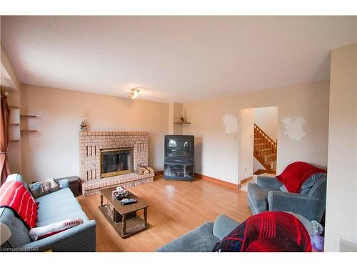 24 Tomahawk Drive, Grimsby, ON - Indoor Photo Showing Living Room With Fireplace