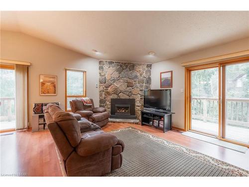 10288 Riverside Drive, Grand Bend, ON - Indoor Photo Showing Living Room With Fireplace