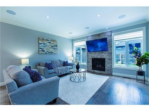 1040 Eagletrace Drive, London, ON - Indoor Photo Showing Living Room With Fireplace