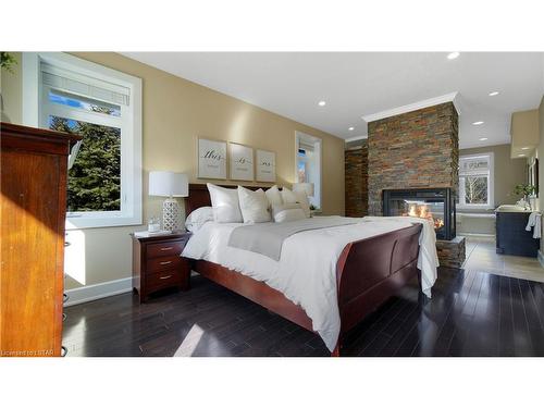 1659 Hamilton Road, London, ON - Indoor Photo Showing Bedroom With Fireplace