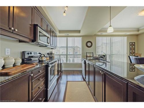204-1030 Coronation Drive, London, ON - Indoor Photo Showing Kitchen With Stainless Steel Kitchen