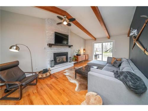 10217 Parkside Crescent, Grand Bend, ON - Indoor Photo Showing Living Room With Fireplace