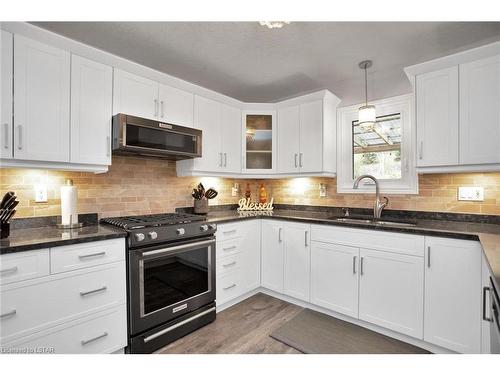 3984 Malpass Road, London, ON - Indoor Photo Showing Kitchen With Double Sink