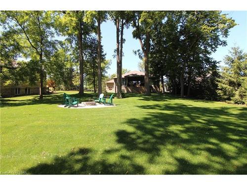 10138 Merrywood Drive, Grand Bend, ON - Outdoor With Backyard