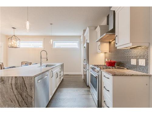 9 Sunrise Lane, Grand Bend, ON - Indoor Photo Showing Kitchen With Upgraded Kitchen