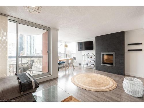 810-600 Talbot Street, London, ON - Indoor Photo Showing Living Room With Fireplace