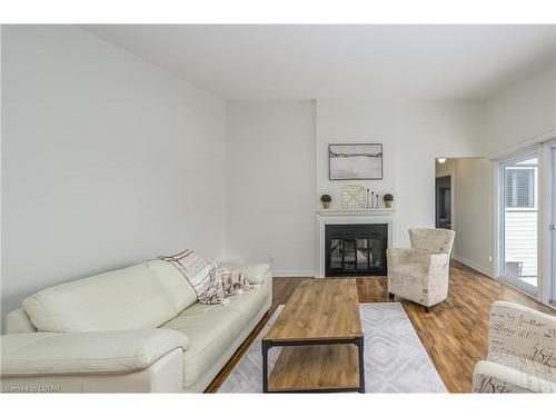 44-60 Fiddlers Green Road, London, ON - Indoor Photo Showing Living Room With Fireplace