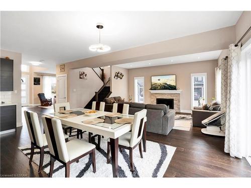 1552 Sandridge Avenue, London, ON - Indoor Photo Showing Dining Room With Fireplace