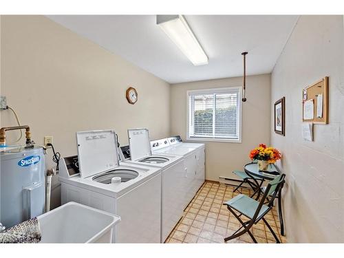 102-8 Lake Road, Grand Bend, ON - Indoor Photo Showing Laundry Room