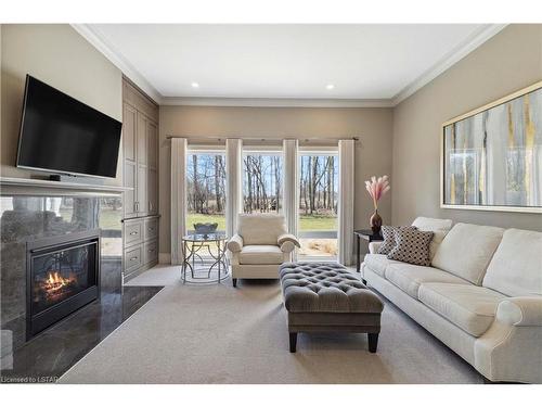 3845 Deer Trail, London, ON - Indoor Photo Showing Living Room With Fireplace