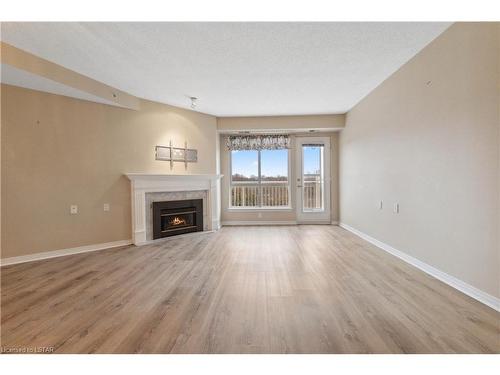 403-511 Gainsborough Road, London, ON - Indoor Photo Showing Living Room With Fireplace
